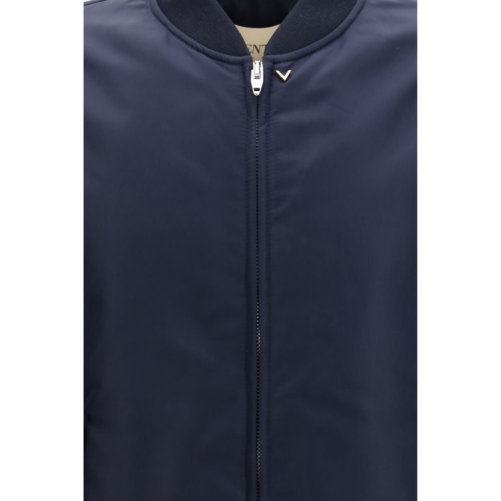 Bomber Jacket by Valentino Garavani for men in nylon blue & gold showcases a bohemian silhouette, artfully detailed with a bohemian and signature pockets for a truly bohemian finish.