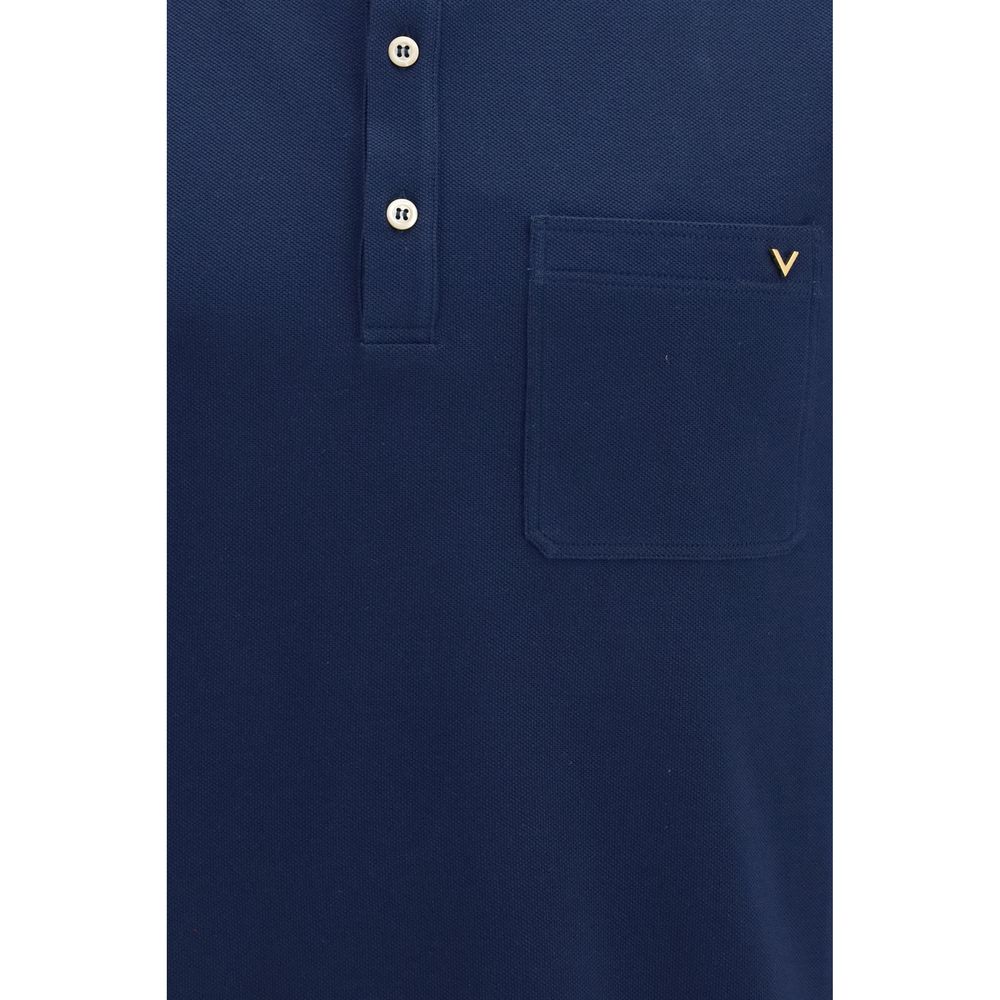 This Polo Shirt by Valentino Garavani for men in cotton blue presents a flawless silhouette, showcasing flawless detailing and a refined for a truly flawless aesthetic.