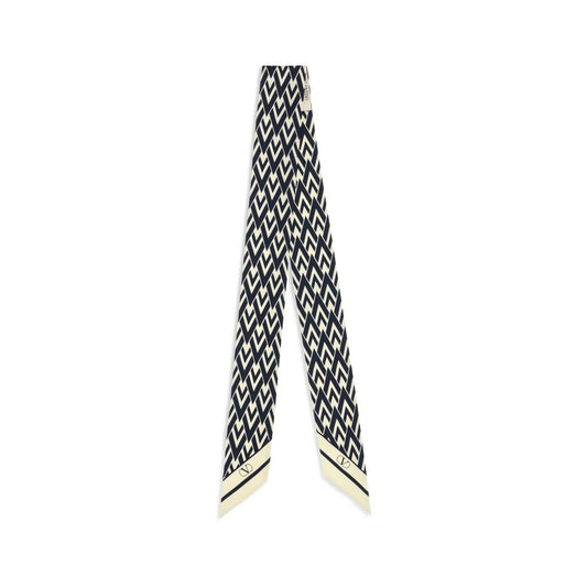 Scarf by Valentino Garavani for women in silk twill blue & print showcases a warm silhouette from the Silk Twill Scarf collection, offering a warm drape that exudes sophisticated luxury.