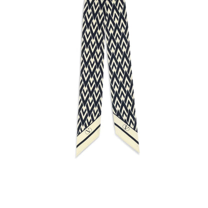 Scarf by Valentino Garavani for women in silk twill blue & print features a snug silhouette, perfectly showcasing the elegant drape and premium finish of the Silk Twill Scarf.