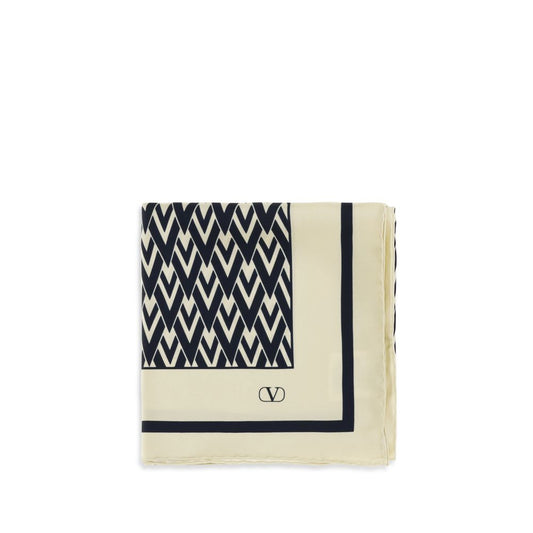 Scarf by Valentino Garavani for women in silk beige & print showcases a warm silhouette from the Silk Scarf collection, offering a warm drape that exudes sophisticated luxury.
