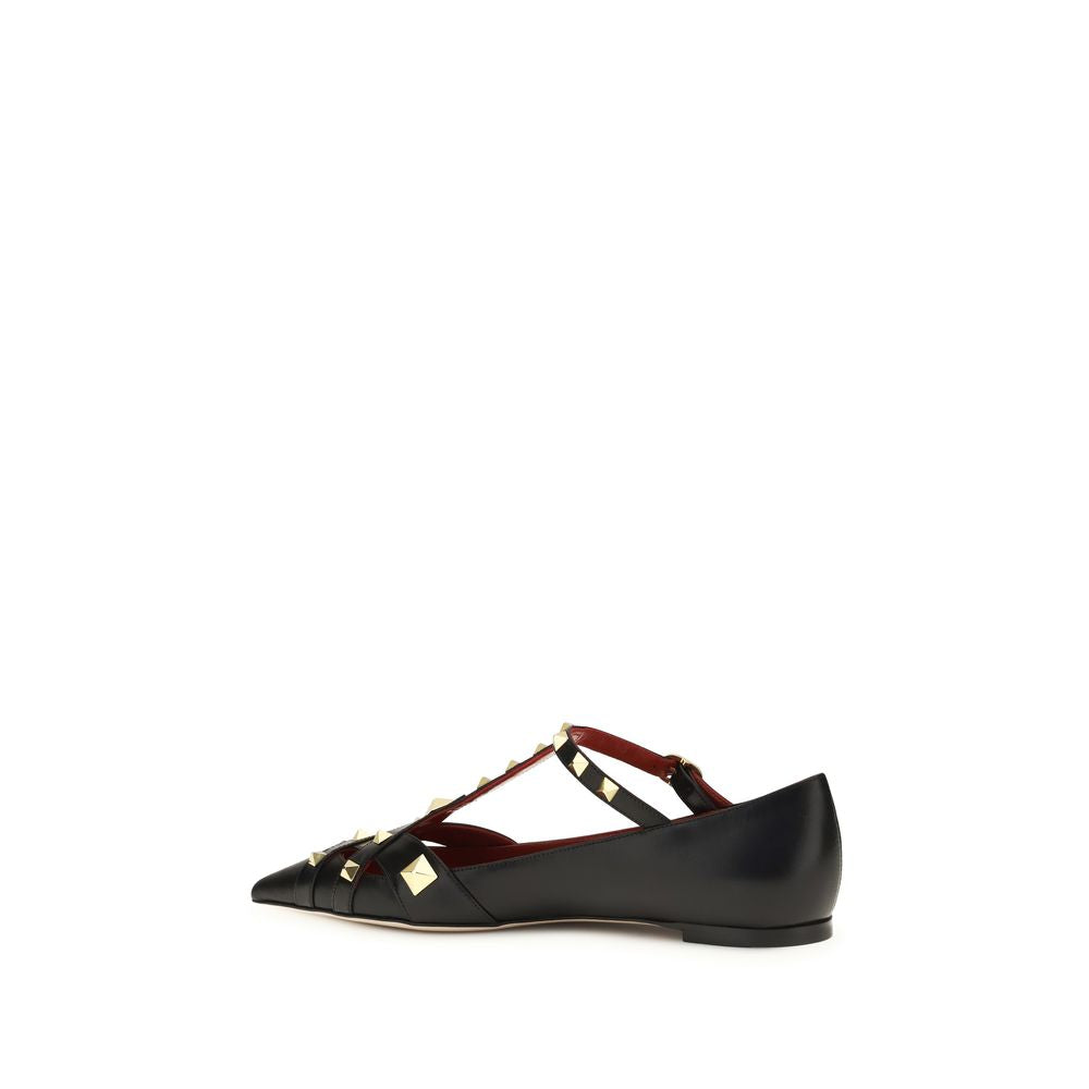 Ballet Flat Shoes by Valentino Garavani for women in goatskin leather black features an captivating silhouette, showcasing the captivating style of the Women's Goatskin Leather Ballet Flat Shoes with its distinct and refined almond toe style.