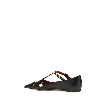 Ballet Flat Shoes by Valentino Garavani for women in goatskin leather black features an captivating silhouette, showcasing the captivating style of the Women's Goatskin Leather Ballet Flat Shoes with its distinct and refined almond toe style.