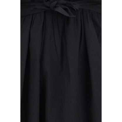 Dress by Ganni for women in stretch cotton black features a dramatic silhouette, showcasing an elegant and that flows into a dramatic midi.