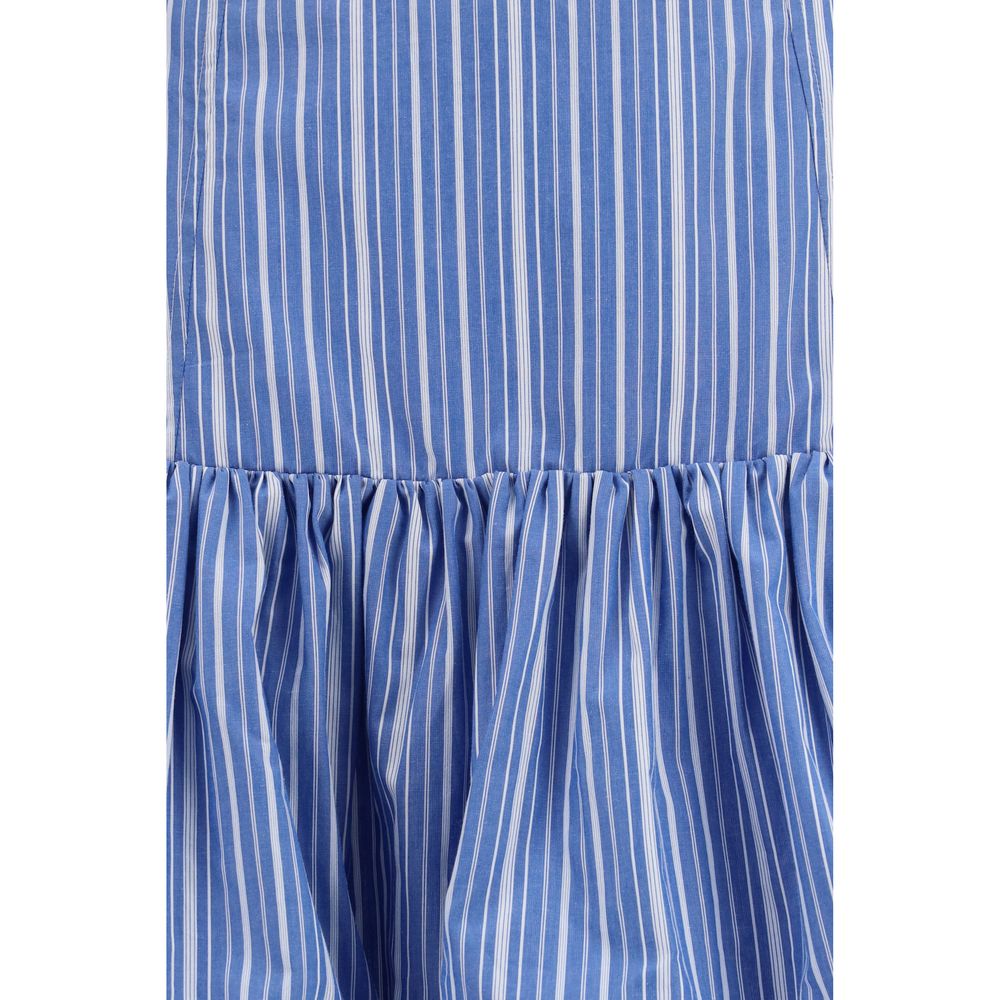 Skirt by Ganni for women in cotton blue, patterned & striped showcases a sultry silhouette, elegantly defined by its mini and the sophisticated sultry design of the Women's Cotton Mini Skirt.