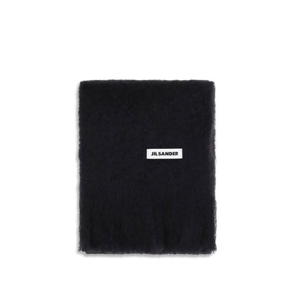 Scarf by Jil Sander for women in wool black & signature features a snug silhouette, perfectly showcasing the elegant drape and premium finish of the Wool Fringes Scarf.