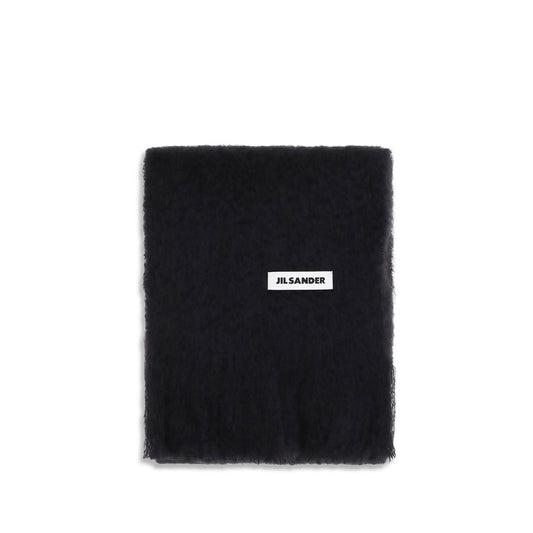 Scarf by Jil Sander for women in wool black & signature features a snug silhouette, perfectly showcasing the elegant drape and premium finish of the Wool Fringes Scarf.