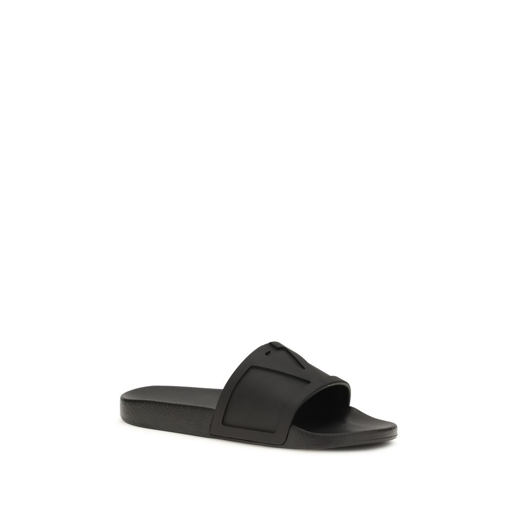 Flat Slider Sandals by Valentino Garavani for men in rubber black & signature features an architectural design from the V Logo Men's Rubber Flat Slider Sandals collection, defined by a architectural flat and for a architectural finish.