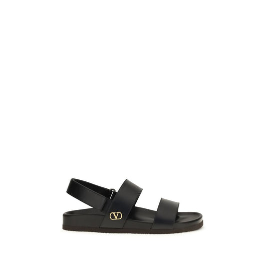 Flat Sandals by Valentino Garavani for men in bos taurus calfskin leather black, gold & signature features an effortlessly chic silhouette from the V Logo Men's Bos Taurus Calfskin Leather Flat Sandals collection, showcasing a effortlessly chic flat and elegant .