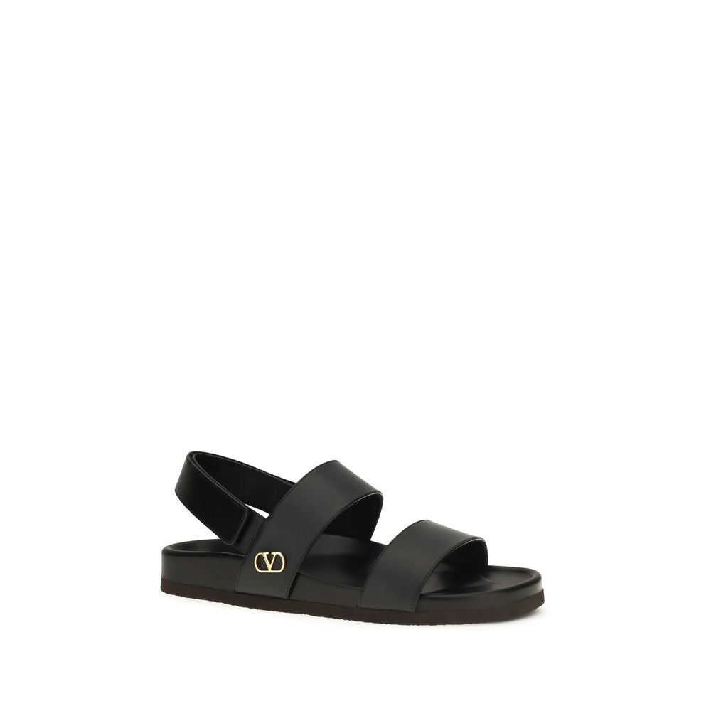 Flat Sandals by Valentino Garavani for men in bos taurus calfskin leather black, gold & signature showcases a sculptural silhouette as V Logo Men's Bos Taurus Calfskin Leather Flat Sandals, defined by a sculptural flat and sculptural for a sculptural look.
