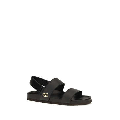 Flat Sandals by Valentino Garavani for men in bos taurus calfskin leather black, gold & signature showcases a sculptural silhouette as V Logo Men's Bos Taurus Calfskin Leather Flat Sandals, defined by a sculptural flat and sculptural for a sculptural look.