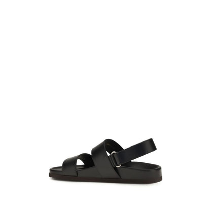 Flat Sandals by Valentino Garavani for men in bos taurus calfskin leather black, gold & signature features an statuesque V Logo Men's Bos Taurus Calfskin Leather Flat Sandals silhouette with a refined flat and elegant .