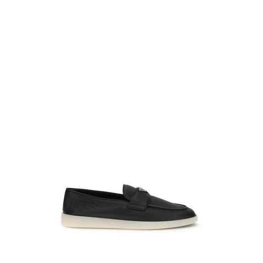 Loafer Slip-On Strap Shoes by Prada for men in bos taurus suede calf leather black features an dynamic silhouette from the Men's Bos Taurus Suede Calf Leather Loafer Slip-On Strap Shoes collection, defined by a dynamic and for a dynamic look.