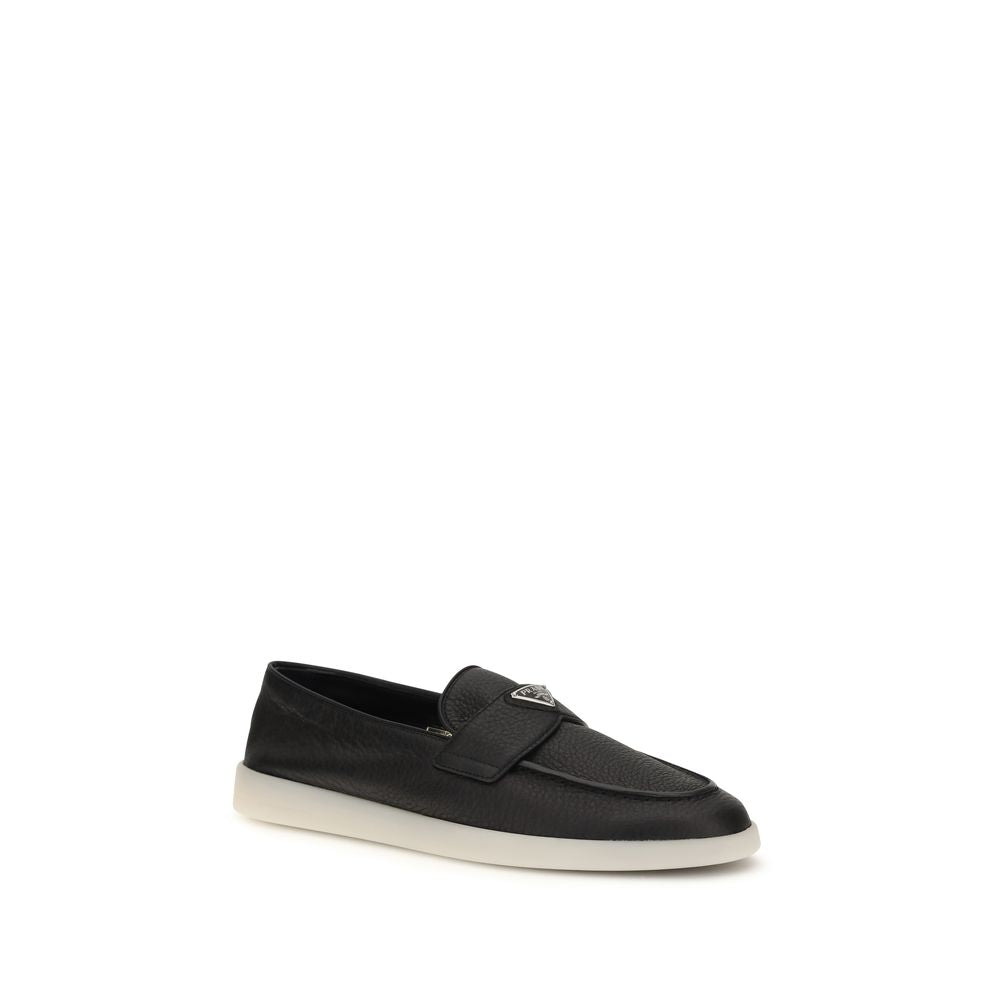 Loafer Slip-On Strap Shoes by Prada for men in bos taurus suede calf leather black features an dynamic silhouette from the Men's Bos Taurus Suede Calf Leather Loafer Slip-On Strap Shoes collection, defined by a dynamic and for a dynamic look.