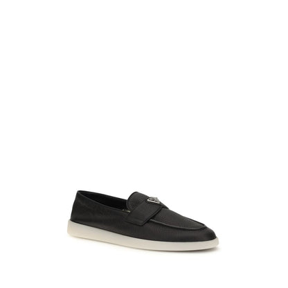 Loafer Slip-On Strap Shoes by Prada for men in bos taurus suede calf leather black features an dynamic silhouette from the Men's Bos Taurus Suede Calf Leather Loafer Slip-On Strap Shoes collection, defined by a dynamic and for a dynamic look.