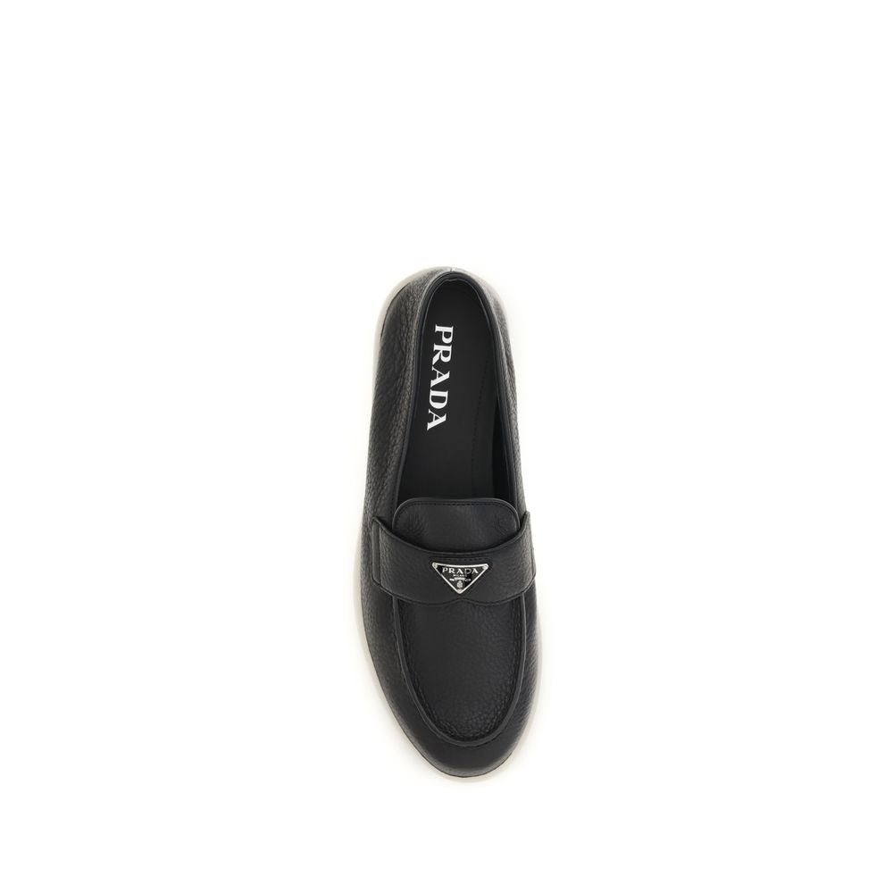 Loafer Slip-On Strap Shoes by Prada for men in bos taurus suede calf leather black showcases a impeccable silhouette as Men's Bos Taurus Suede Calf Leather Loafer Slip-On Strap Shoes, artfully designed with a impeccable and refined for a impeccable finish.