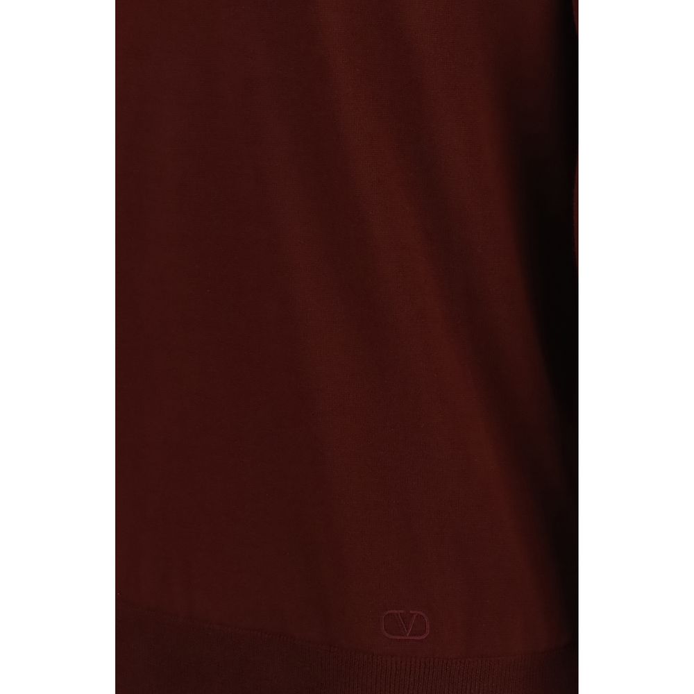 Polo Shirt by Valentino Garavani for men in merino wool bordeaux showcases a sharp silhouette, detailed with a refined and sharp for a sophisticated finish.