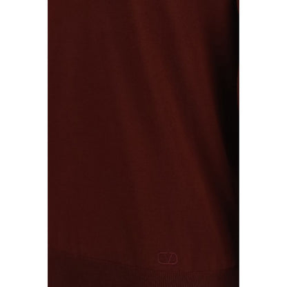 Polo Shirt by Valentino Garavani for men in merino wool bordeaux showcases a sharp silhouette, detailed with a refined and sharp for a sophisticated finish.