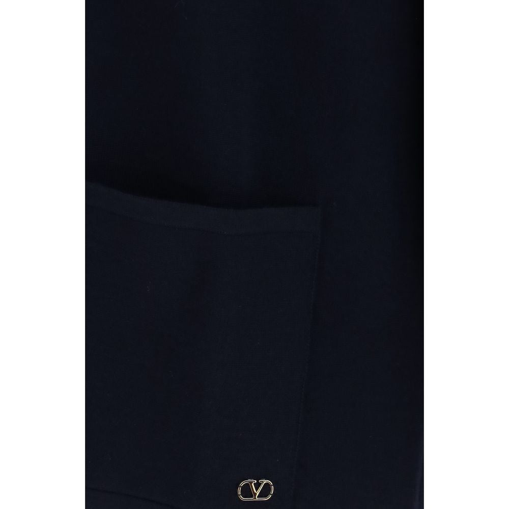 Cardigan by Valentino Garavani for men in merino wool blue & signature showcases a luxurious silhouette, meticulously detailed with a sophisticated and for a refined finish.