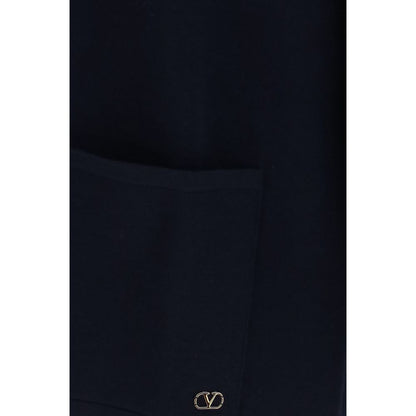 Cardigan by Valentino Garavani for men in merino wool blue & signature showcases a luxurious silhouette, meticulously detailed with a sophisticated and for a refined finish.