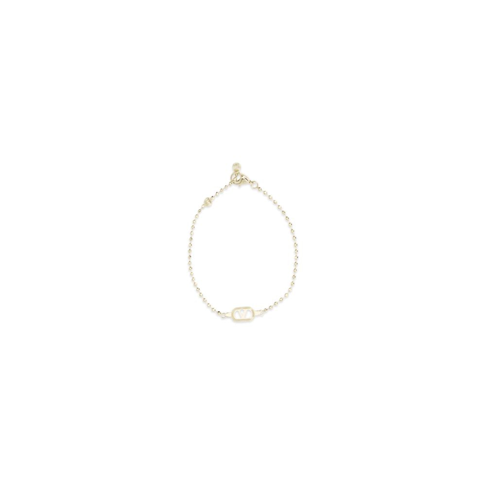 Bracelet by Valentino Garavani for women in bos taurus calfskin nappa leather & palladium gold showcases a cosmopolitan silhouette, artfully capturing the essence of the cosmopolitan Women's Gold & Crystal Bracelet with a cosmopolitan .