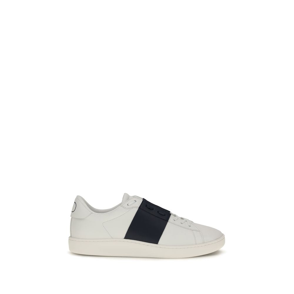 Sneakers by Valentino Garavani for men in bos taurus calf leather blue presents a impeccable silhouette as Men's Low Top Slip On Bos Taurus Calf Leather Sneakers, expertly defined by a impeccable low-top slip-on style for a impeccable, high-fashion look.