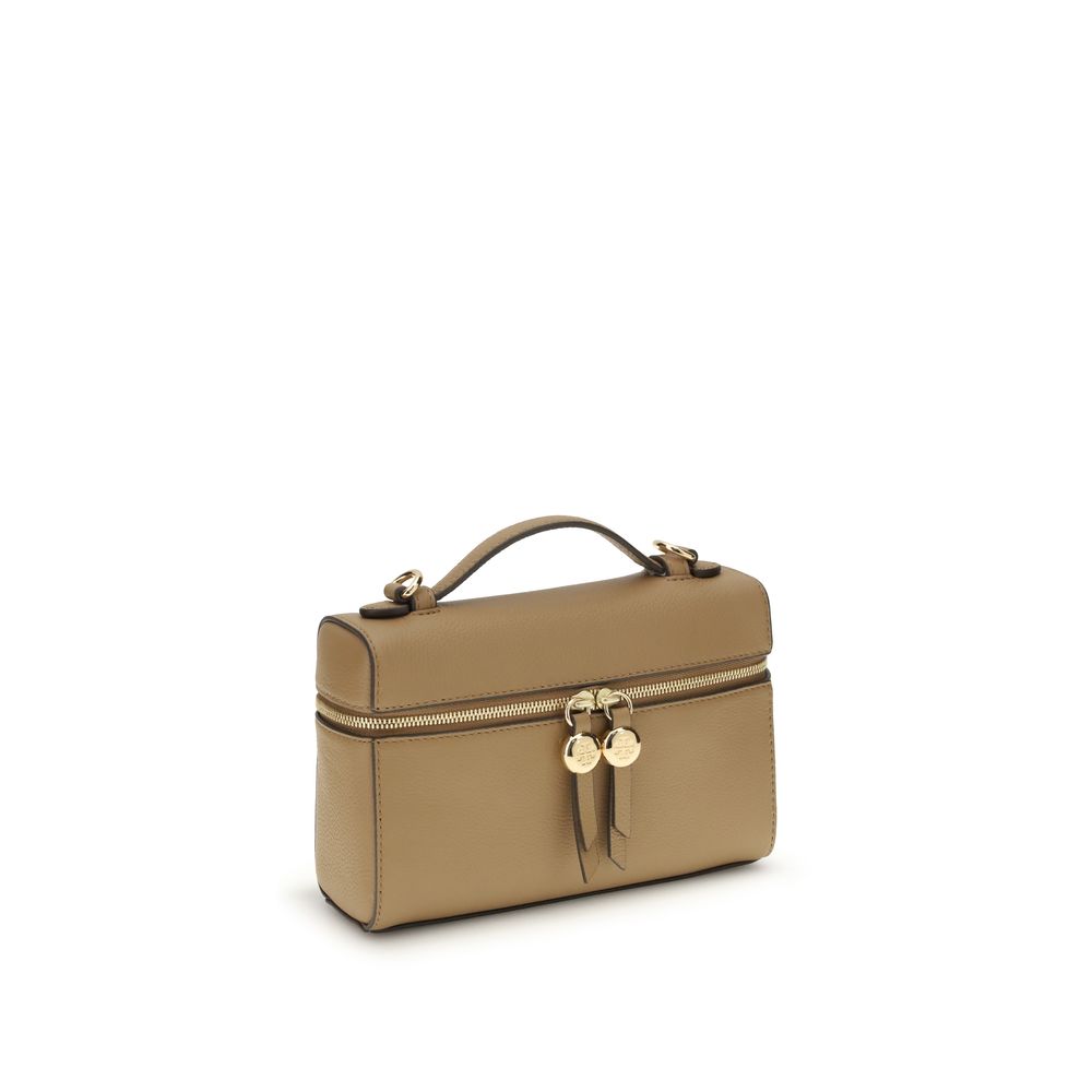 This Mini Crossbody Handbag by Tory Burch for women in bos taurus calf leather and beige presents a sculptural silhouette featuring a secure zipper, ample cardholder, and versatile crossbody-strap, handle & adjustable-strap for a sculptural finish.