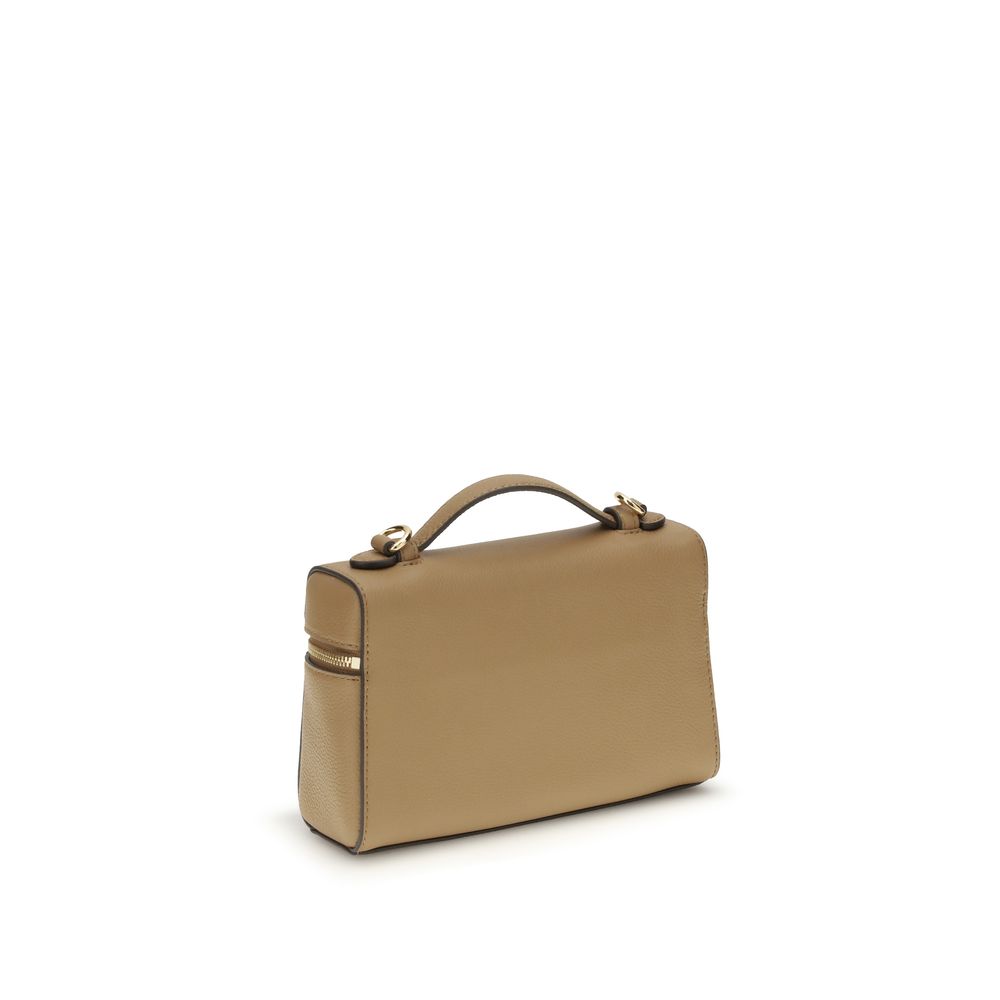 Mini Crossbody Handbag by Tory Burch for women in bos taurus calf leather beige features a refined silhouette, showcasing a secure zipper, organized cardholder, and versatile crossbody-strap, handle & adjustable-strap for a refined finish.