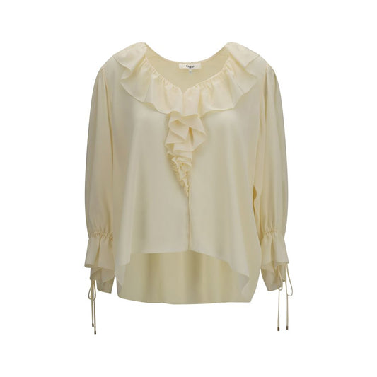 Blouse by Chloé for women in silk beige & signature showcases a sublime silhouette, artfully detailed with a sublime v-neck neckline and long-sleeve for a sophisticated, sublime finish.
