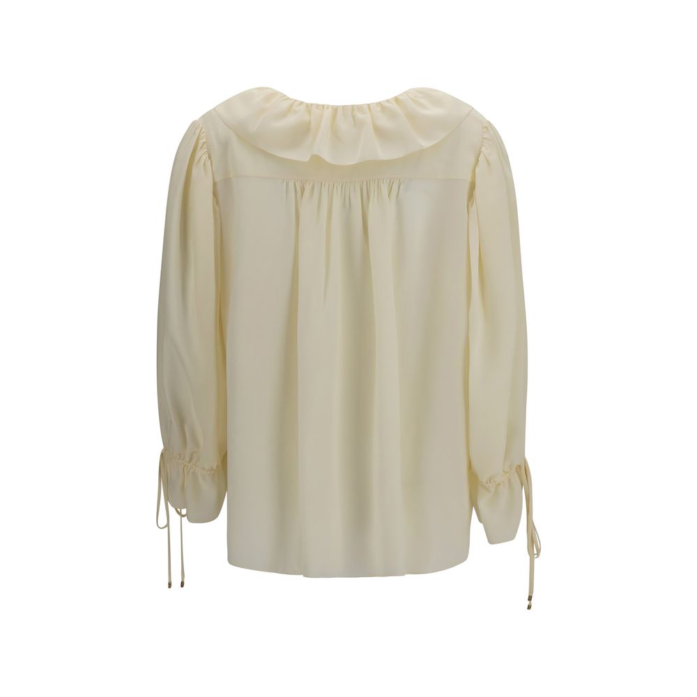 Blouse by Chloé for women in silk beige & signature features an architectural silhouette with a refined and elegant v-neck neckline for a architectural look.