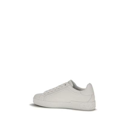 Sneakers by Dolce & Gabbana for men in bos taurus calfskin leather white presents a sumptuous silhouette, artfully capturing the essence of the Men's Low Top Bos Taurus Calfskin Leather Sneakers with its sumptuous low-top style design.