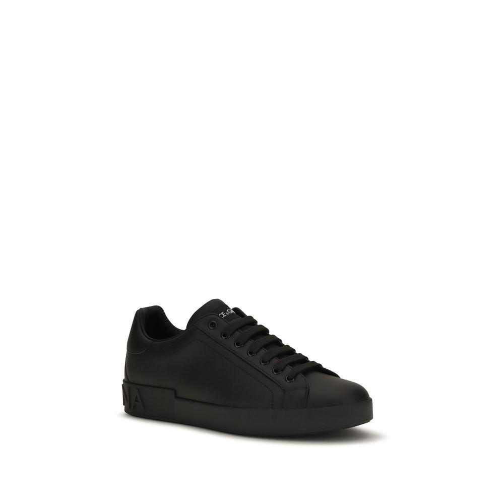 Sneakers by Dolce & Gabbana for men in bos taurus calfskin leather black presents a impeccable silhouette as Men's Low Top Bos Taurus Calfskin Leather Sneakers, expertly defined by a impeccable low-top style for a impeccable, high-fashion look.