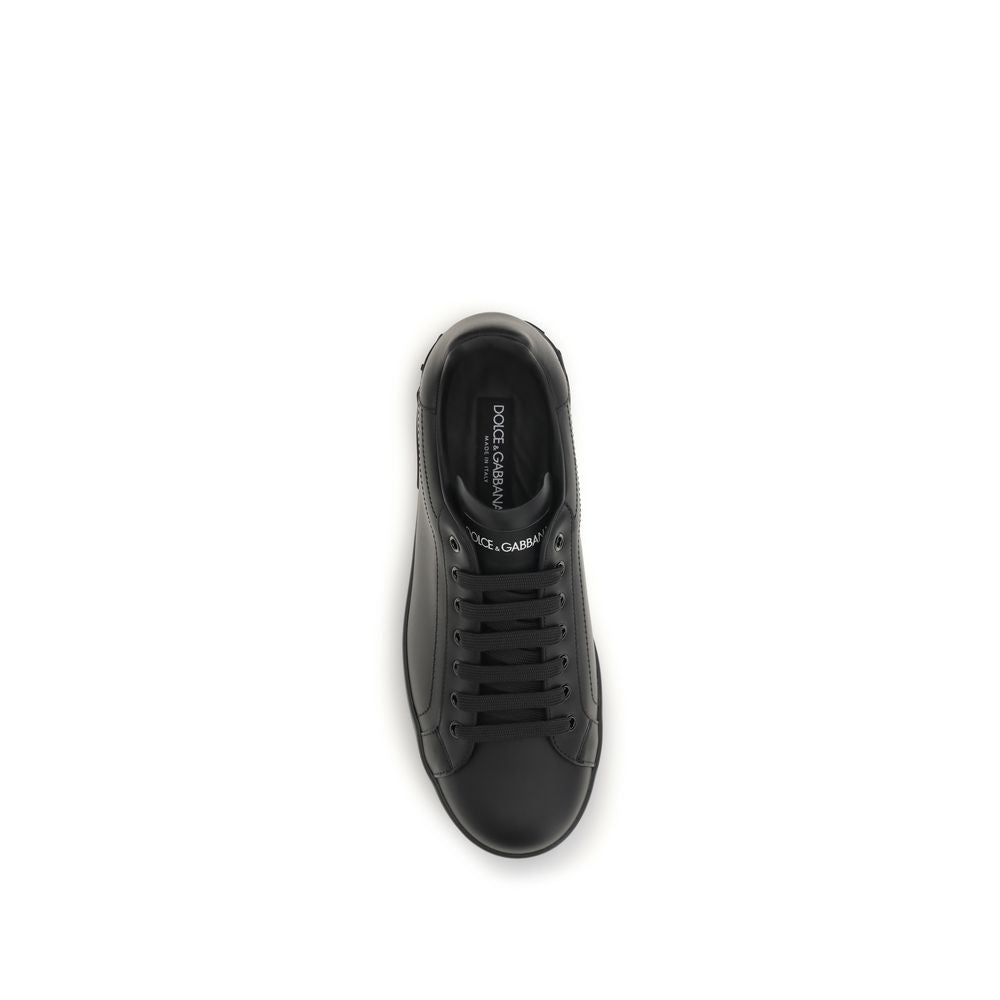 Sneakers by Dolce & Gabbana for men in bos taurus calfskin leather black presents a on trend silhouette from the Men's Low Top Bos Taurus Calfskin Leather Sneakers collection, showcasing a on trend low-top style for an elevated aesthetic.