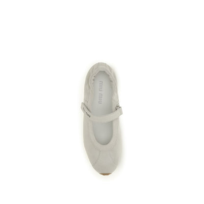 Ballet Flat Shoes by Miu Miu for women in bos taurus calf suede leather white & print presents a effortless chic silhouette, showcasing the Women's Bos Taurus Calf Suede Leather Ballet Flat Shoes design with a effortless chic and for a sophisticated look.