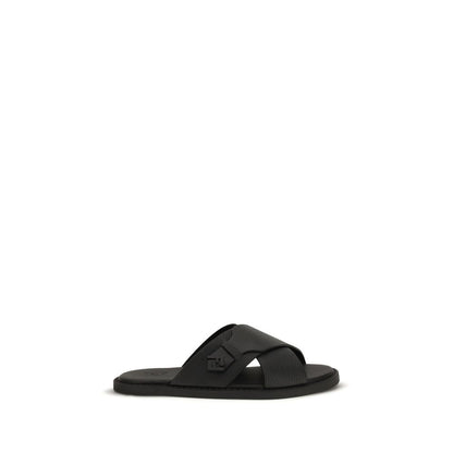 Flat Slider Sandals by Fendi for men in bos taurus calfskin leather black features an statuesque Men's Bos Taurus Calfskin Leather Flat Slider Sandals silhouette with a refined flat and elegant round toe style.