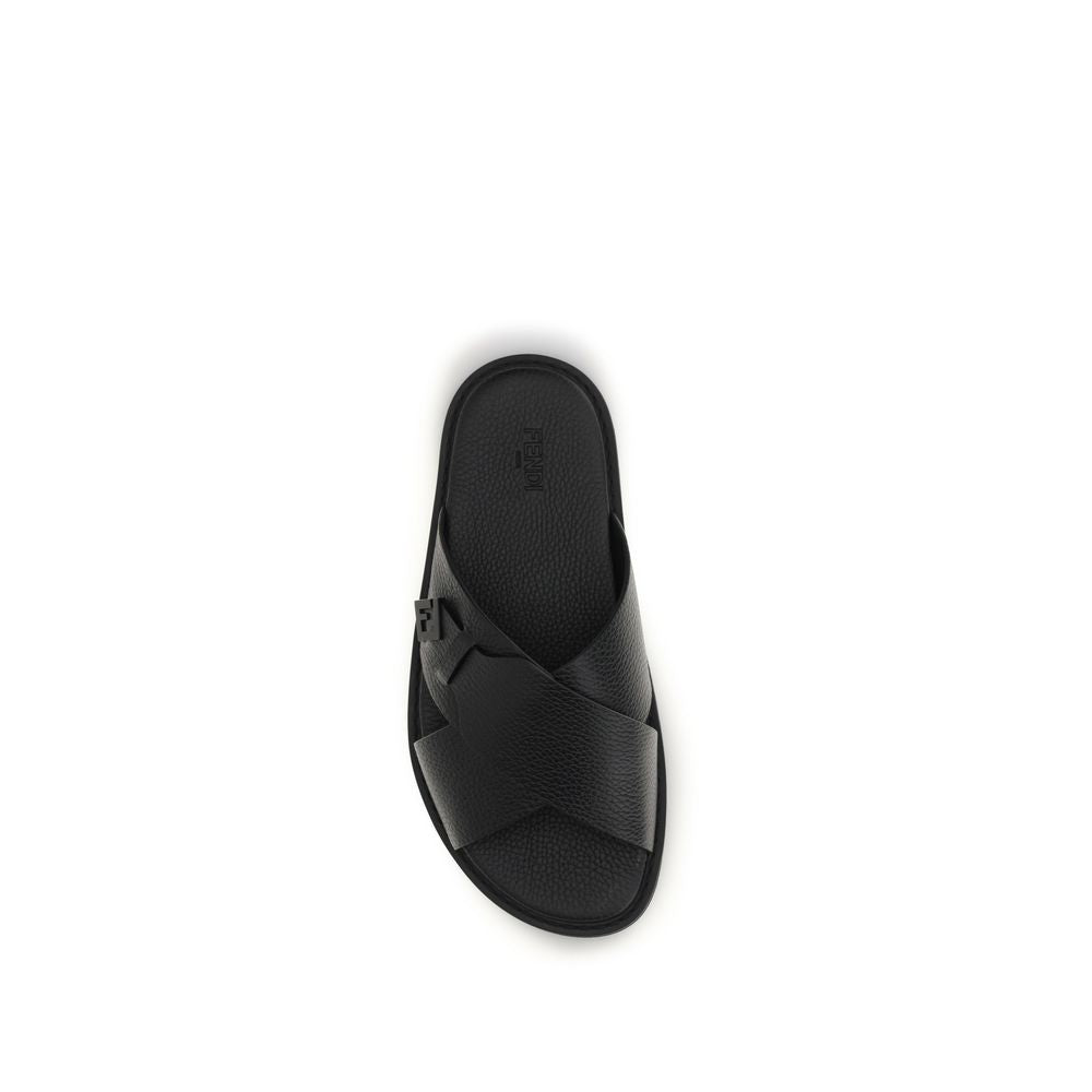 Flat Slider Sandals by Fendi for men in bos taurus calfskin leather black showcases a sculptural silhouette as Men's Bos Taurus Calfskin Leather Flat Slider Sandals, defined by a sculptural flat and sculptural round toe style for a sculptural look.