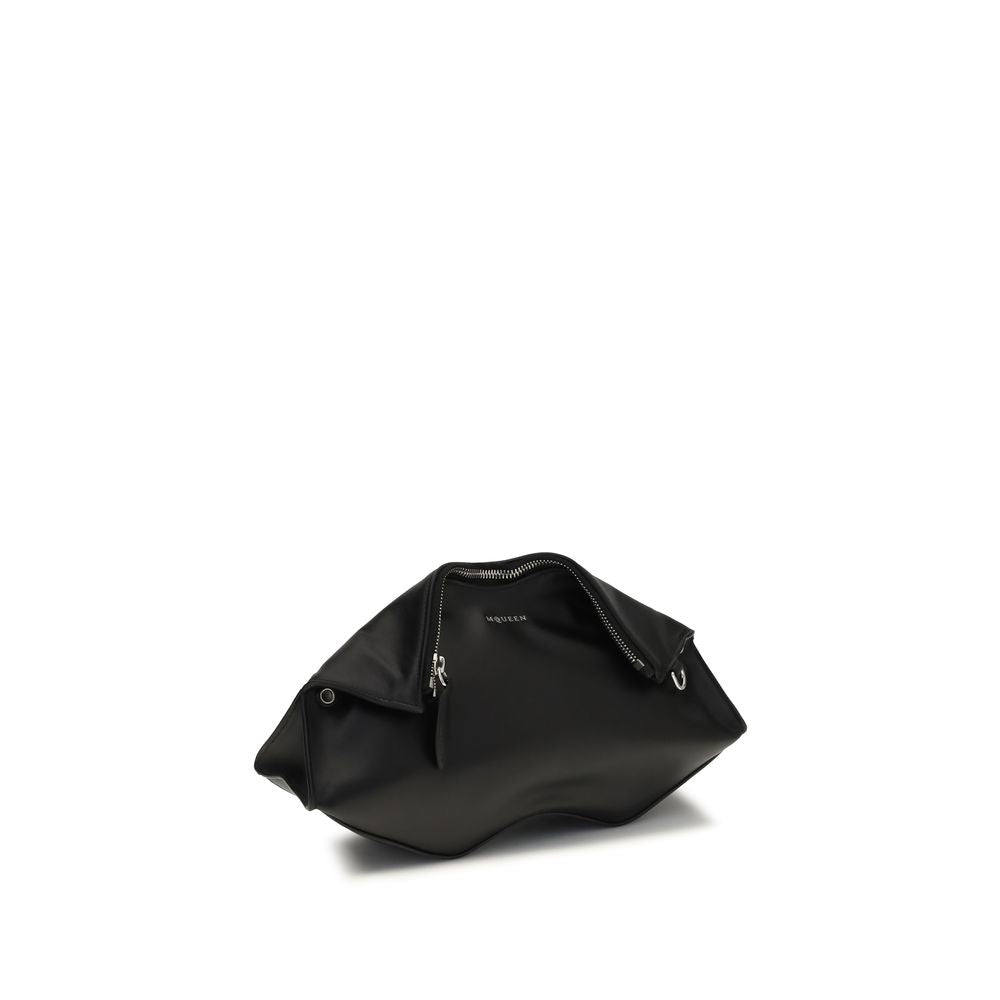 Compact Shoulder Clutch Handbag by Alexander McQueen for women in bos taurus calf leather black features a sculptural silhouette with a secure zipper, ample , and versatile shoulder-strap & adjustable-strap for a sculptural finish.