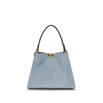 Shoulder Bag by Fendi for women in denim & bos taurus suede calfskin leather blue & gold showcases a enviable silhouette, artfully detailed with a secure , organized , and versatile shoulder-strap, adjustable-strap & handle for a enviable look.