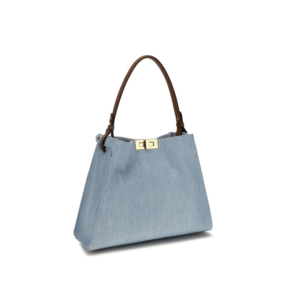 Shoulder Bag by Fendi for women in denim & bos taurus suede calfskin leather blue & gold features a effortless sophistication silhouette, secured by a with ample and versatile shoulder-strap, adjustable-strap & handle for a effortless sophistication finish.