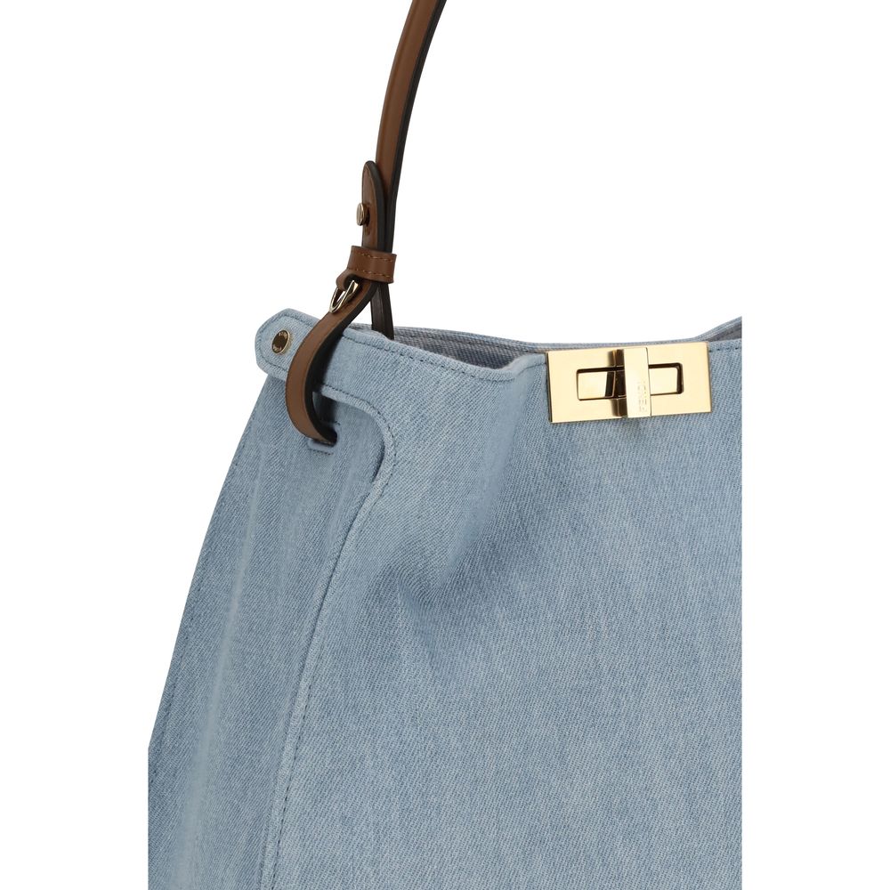 Shoulder Bag by Fendi for women in denim & bos taurus suede calfskin leather blue & gold presents a versatile silhouette, showcasing a secure and versatile with versatile shoulder-strap, adjustable-strap & handle for a sophisticated look.