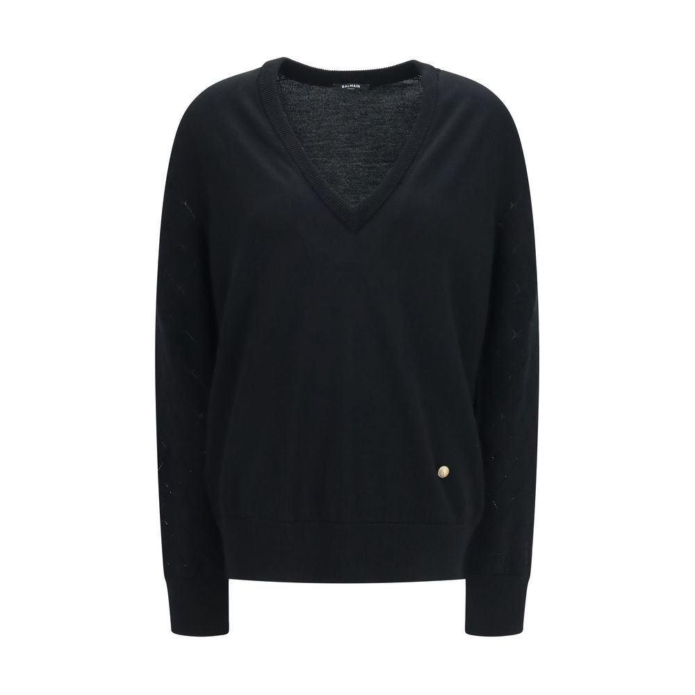Sweatshirt by Balmain for women in merino wool black, gold & patterned features an exquisite silhouette, showcasing and v-neck neckline details for a exquisite look.