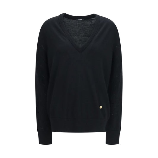 Sweatshirt by Balmain for women in merino wool black, gold & patterned features an exquisite silhouette, showcasing and v-neck neckline details for a exquisite look.