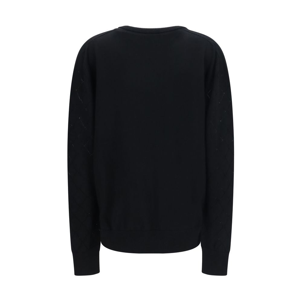 Sweatshirt by Balmain for women in merino wool black, gold & patterned presents a smart casual silhouette, featuring a smart casual v-neck neckline and for a sophisticated look.