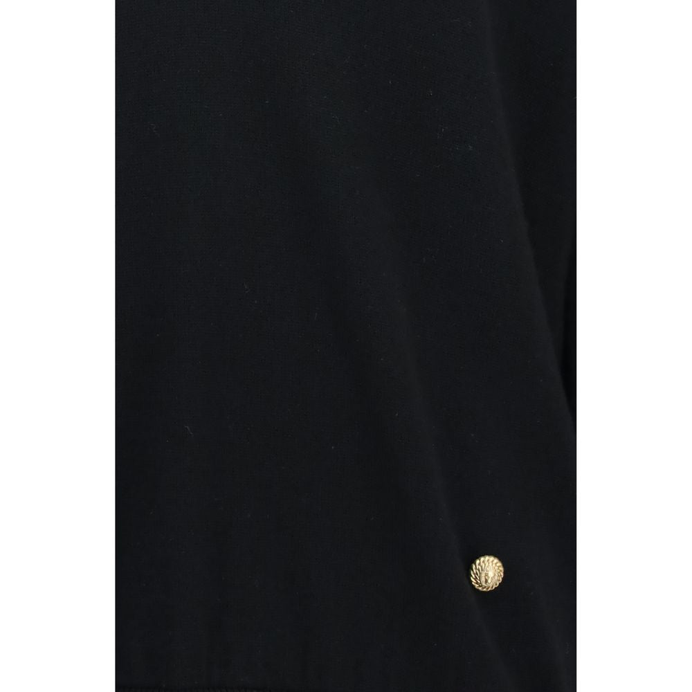 Sweatshirt by Balmain for women in merino wool black, gold & patterned showcases a slouchy chic silhouette, artfully detailed with a slouchy chic and for a slouchy chic finish.