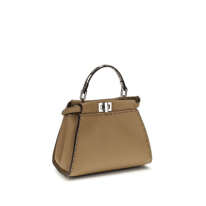 Mini 2-in-1 Shoulder & Crossbody Bag by Fendi for women in bos taurus calfskin leather & palladium beige, natural, palladium, silver & signature features a distinguished silhouette, showcasing a secure zipper and distinguished with versatile crossbody-strap, shoulder-strap, handle & adjustable-strap for a distinguished finish.