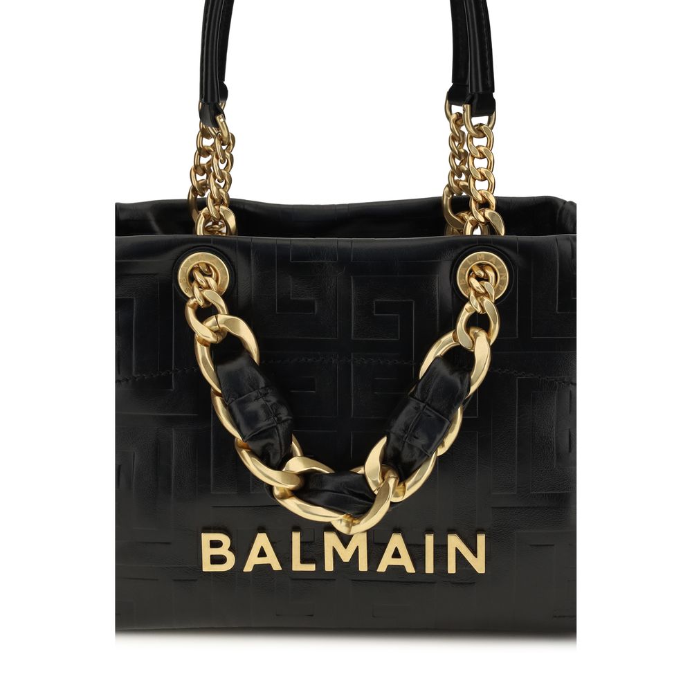 Small Tote Shoulder Bag by Balmain for women in embossed bos taurus calf leather black, gold & signature features a effortless sophistication silhouette, secured by a snap, zipper, hook & button with ample and versatile adjustable-strap & handle for a effortless sophistication finish.