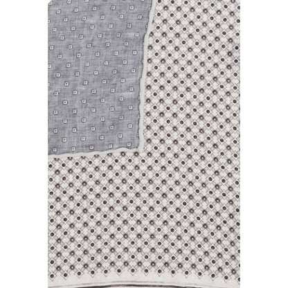 Scarf by Brunello Cucinelli for men in silk gray & patterned showcases a warm silhouette from the Silk Square Scarf collection, offering a warm drape that exudes sophisticated luxury.
