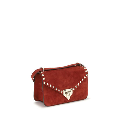 Mini Shoulder Bag by Valentino Garavani for women in nappa & suede leather multicolor & signature features a effortless sophistication silhouette, secured by a zipper & hook with ample single-compartment and versatile shoulder-strap & adjustable-strap for a effortless sophistication finish.