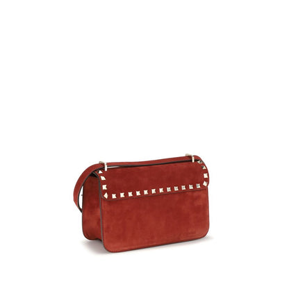 Mini Shoulder Bag by Valentino Garavani for women in nappa & suede leather multicolor & signature presents a versatile silhouette, showcasing a secure zipper & hook and versatile single-compartment with versatile shoulder-strap & adjustable-strap for a sophisticated look.