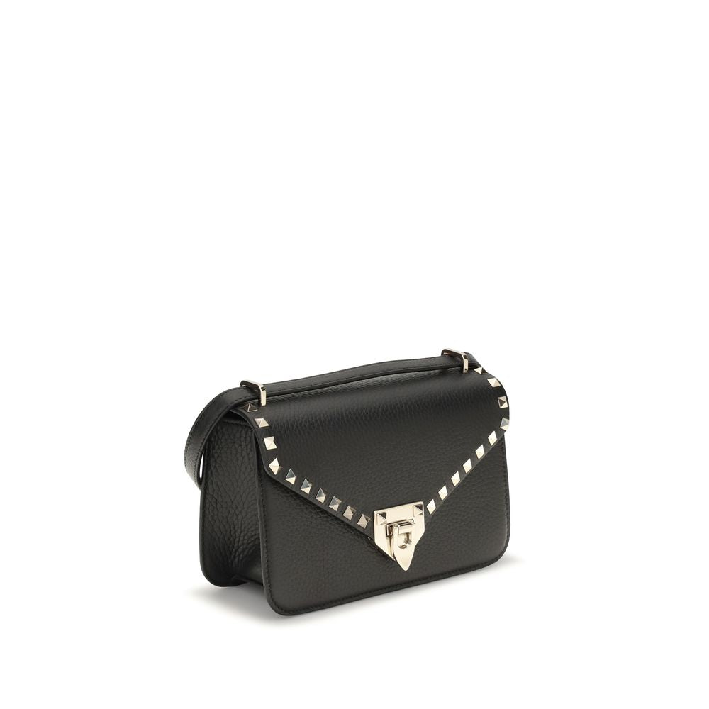 Mini Shoulder Bag by Valentino Garavani for women in bio-acetate cotton & bos taurus calfskin leather black & signature features a distinguished silhouette, showcasing a secure hook and distinguished with versatile shoulder-strap & adjustable-strap for a distinguished finish.